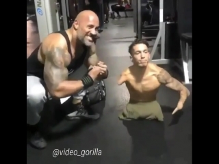 dwayne skala johnson is photographed with a disabled person